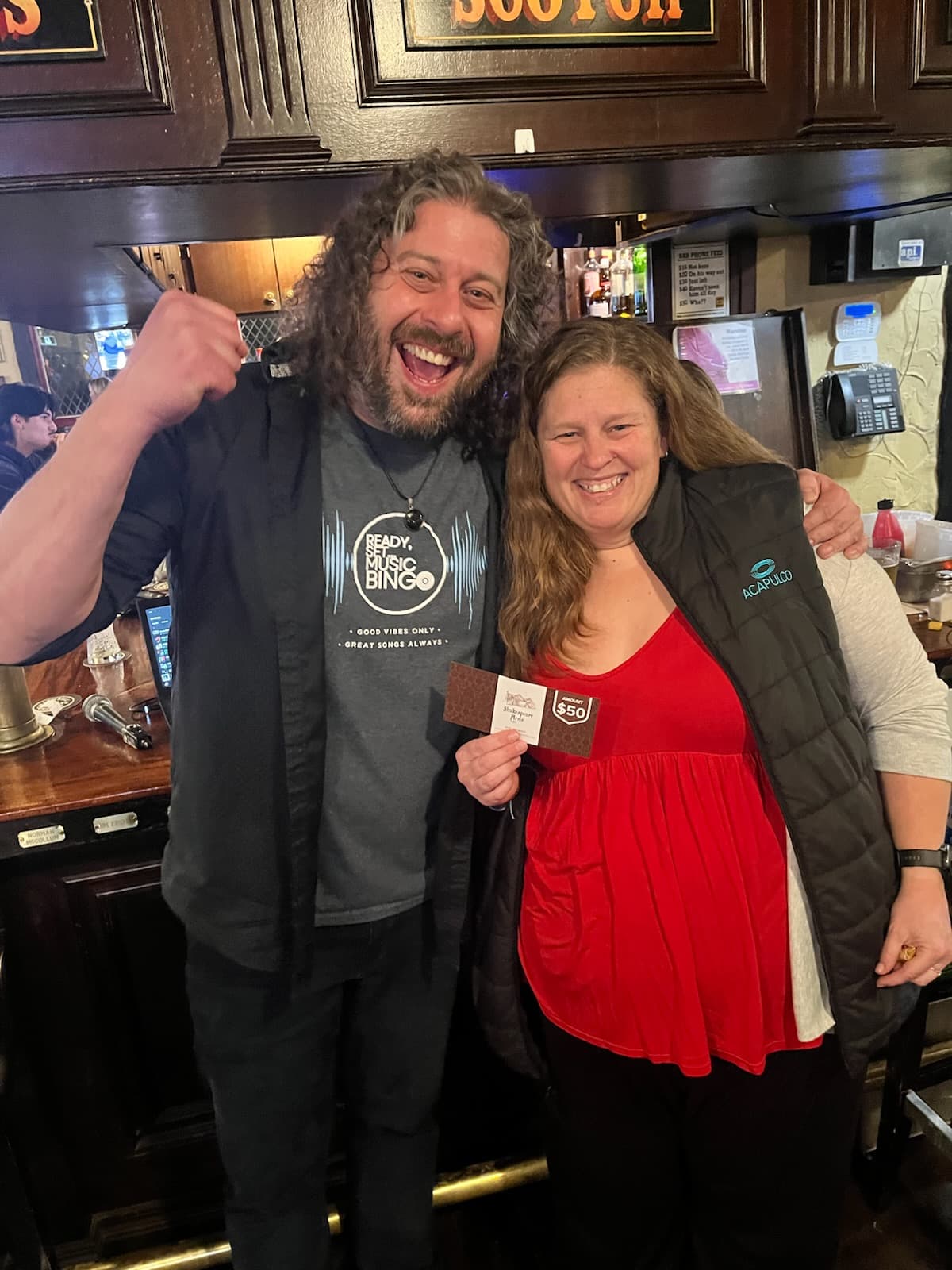 Mike celebrating with a music bingo winner